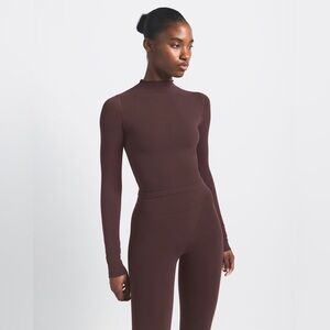 Skims x Nike vintage seamless mock neck crop top